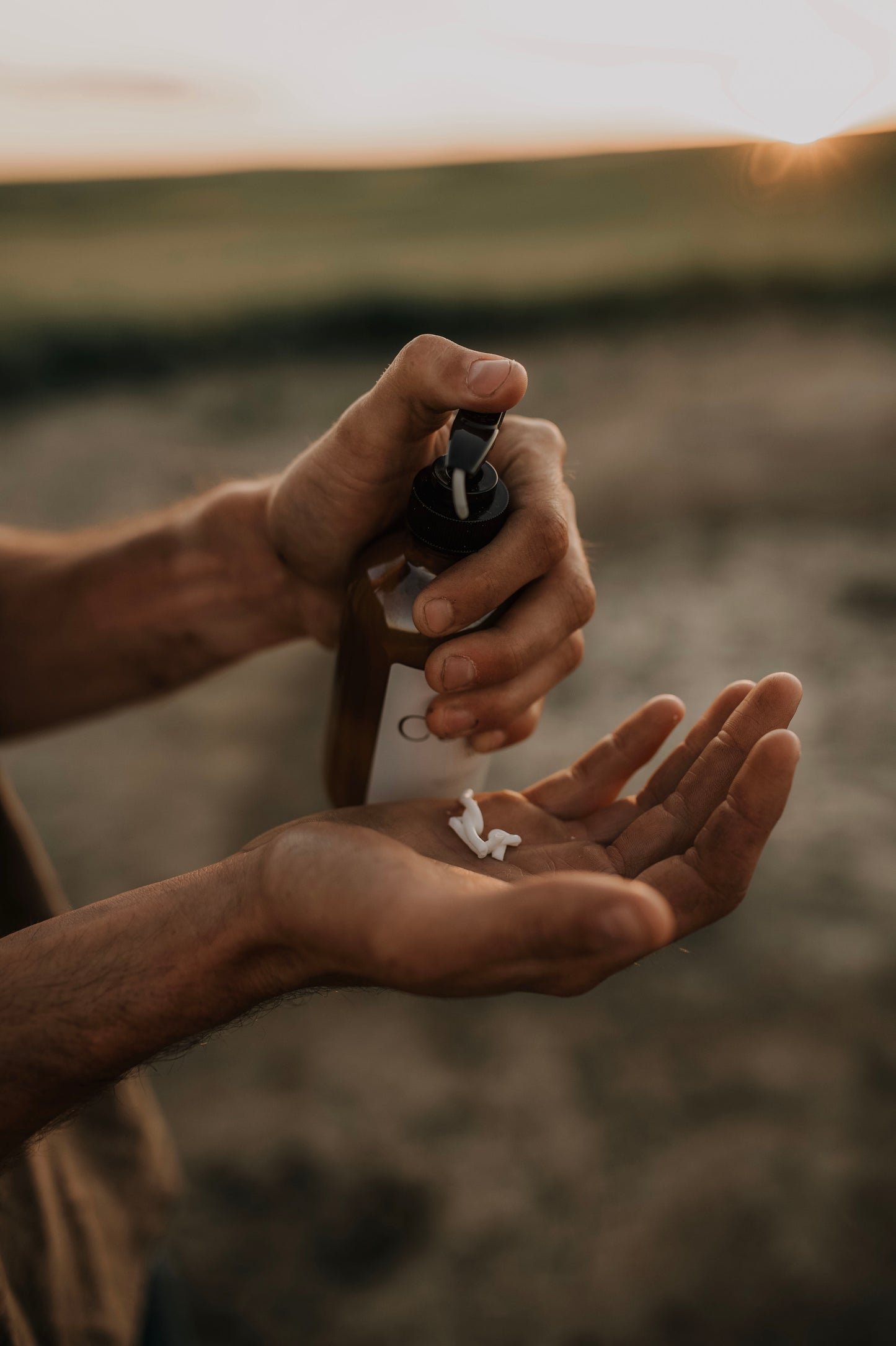 Till & Tallow Cultivated Pump Lotion pumping in farmers hand, handcrafted in Alberta.