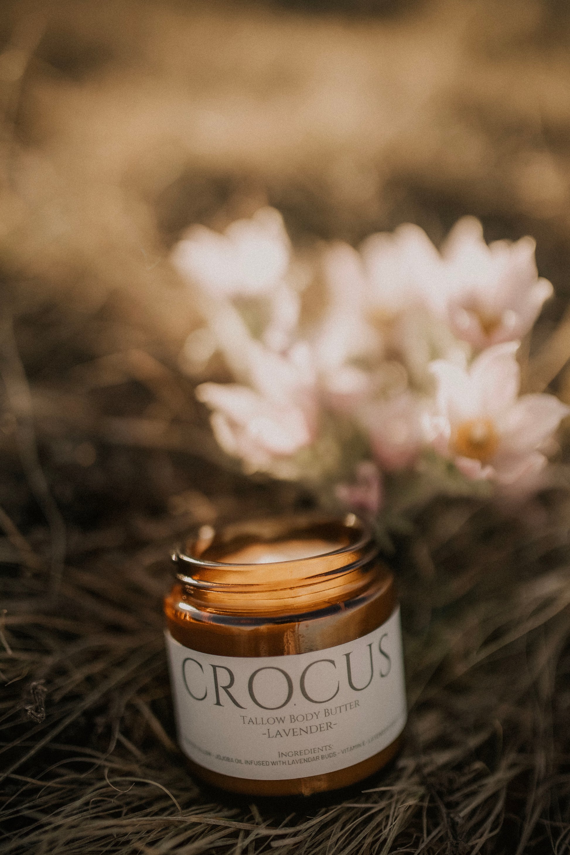 Crocus lavender tallow body butter in amber jar with wild crocus flowers -Alberta made by Till & Tallow