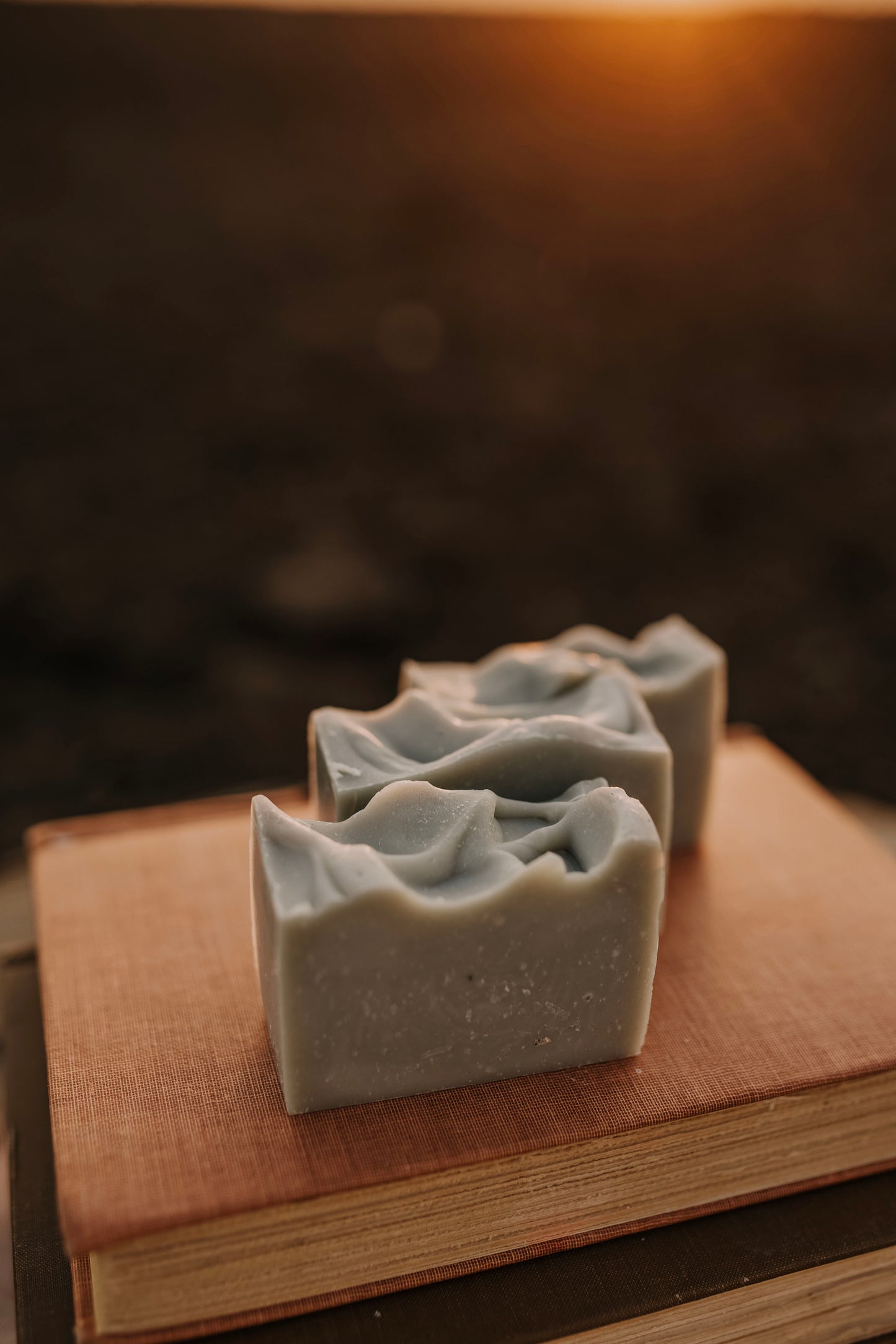 Till & Tallow Garden Mint & Pumice Tallow Bar Soap, on book, handcrafted in Alberta.