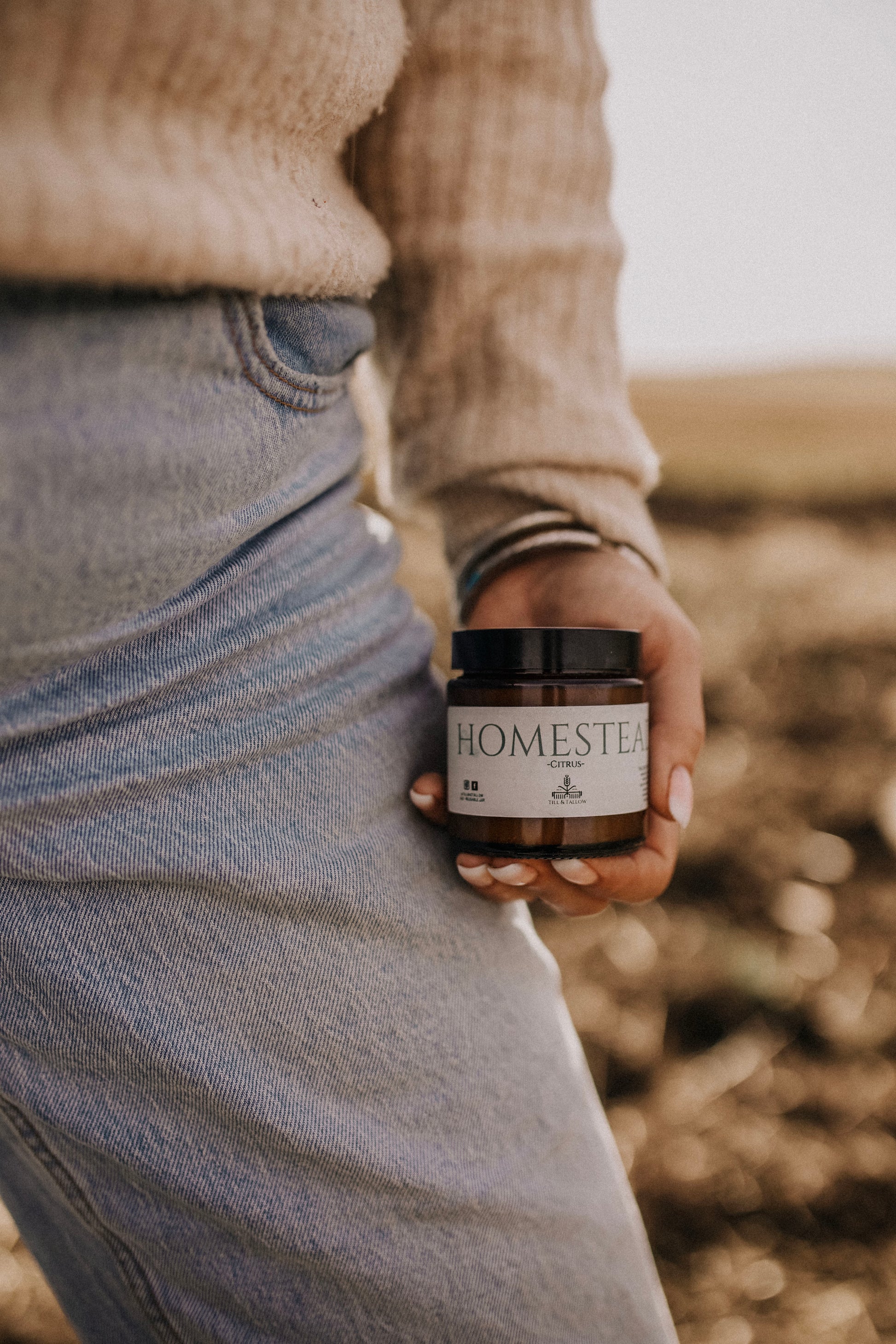 Till & Tallow Homestead Belly Butter in hand, handcrafted in Alberta