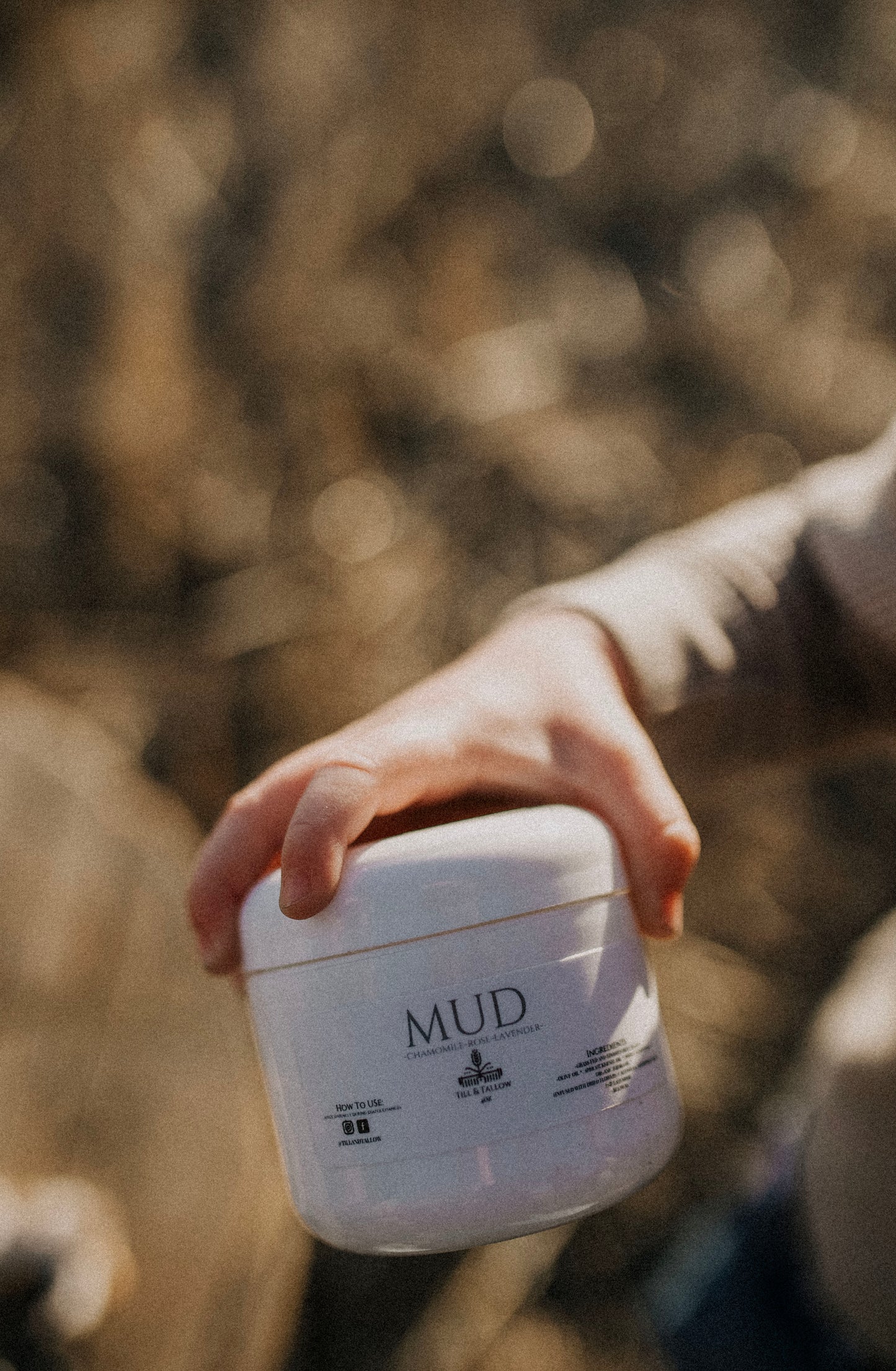 Till & Tallow Mud Baby Bum Balm Holding jar, handcrafted in Alberta.